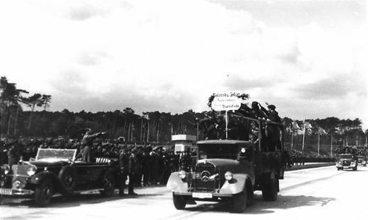 Workers greet the Führer and Fritz Todt at the 1000 km of the Reichsautobahn